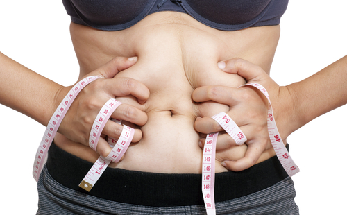 woman's expanding waistline
